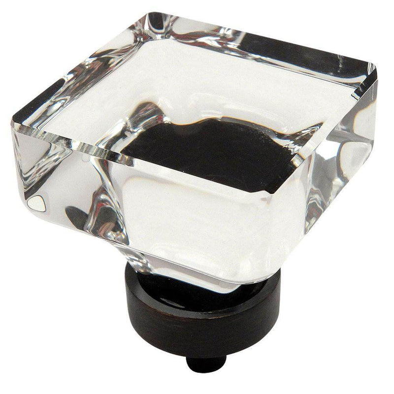Clear glass cabinet drawer knob in oil rubbed bronze finish with one and three eighths inch length