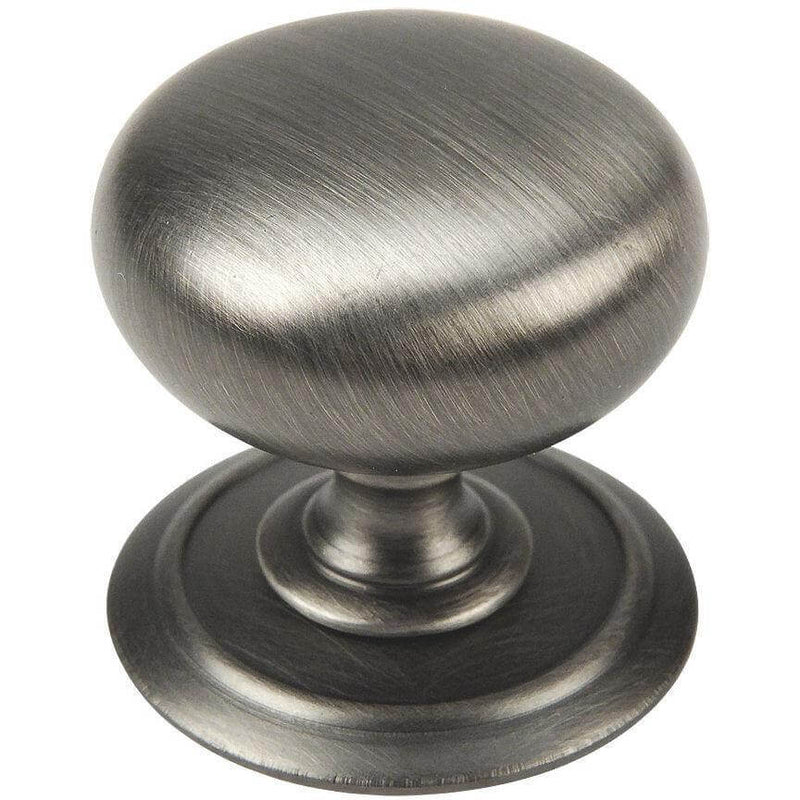 Round antique silver knob with wide flat base and an embossed ring