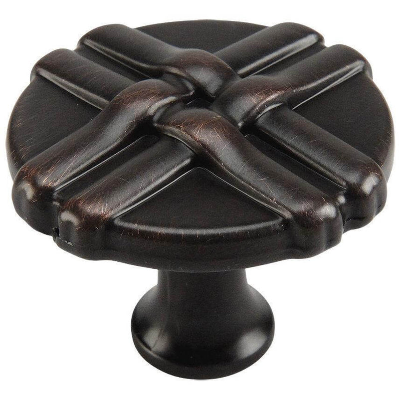 Oil rubbed bronze round cabinet knob with woven lines over the surface
