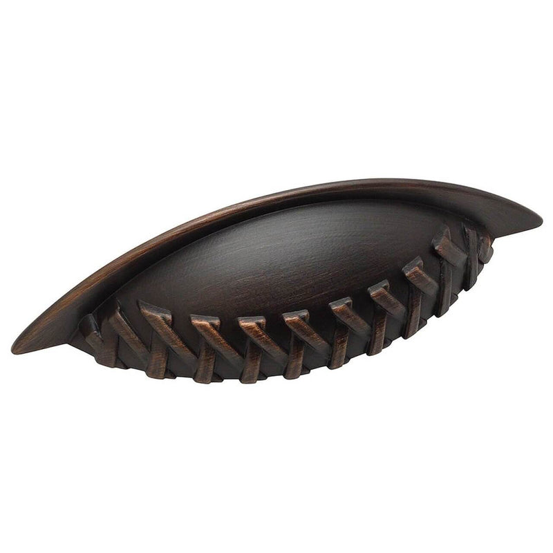 Three inch hole spacing cabinet cup pull in oil rubbed bronze with braid design at the edge