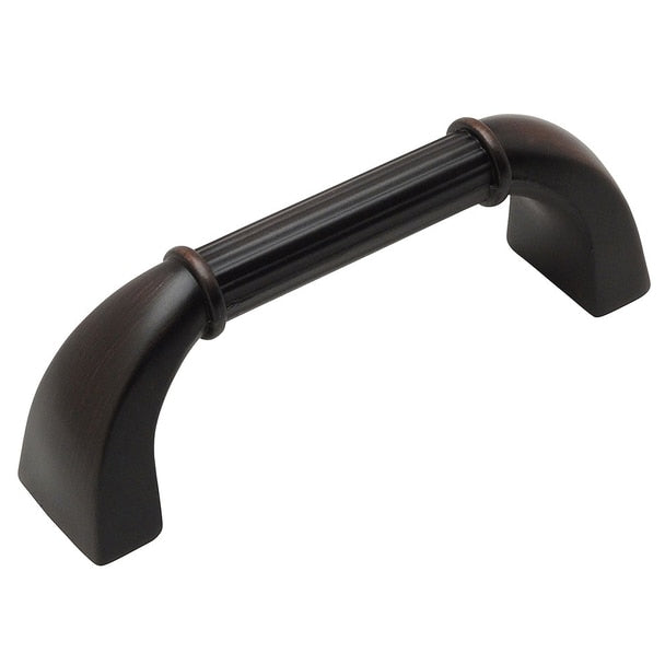 Three inch hole spacing cabinet pull with sturdy ends and lines engraving in the middle