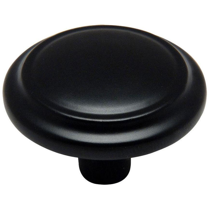 Round cabinet knob with raised centre and one and a quarter inch diameter
