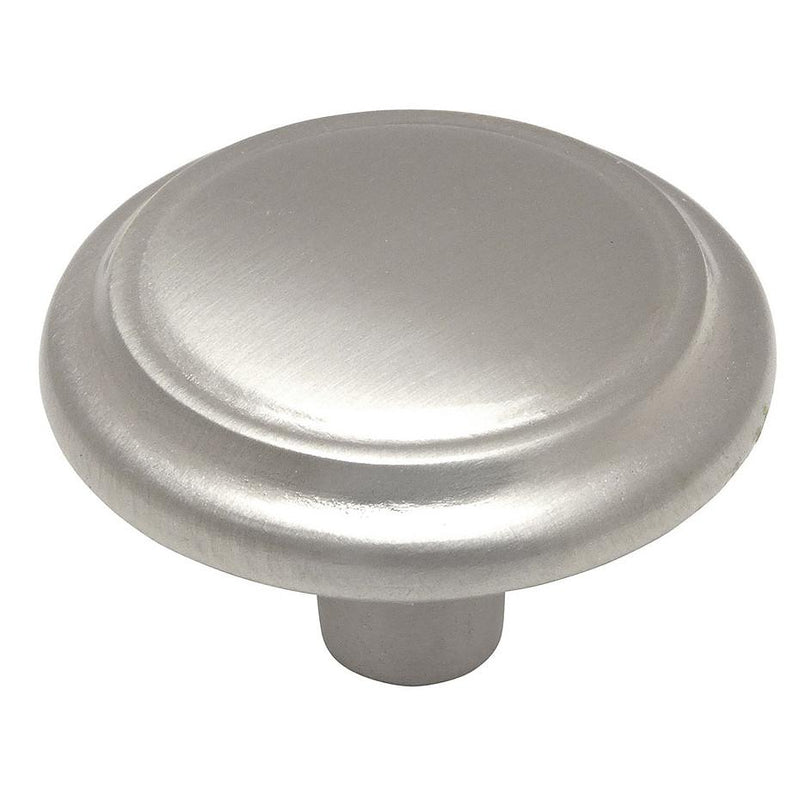 Round cabinet knob in satin nickel with slightly raised centre design and one and a quarter inch diameter