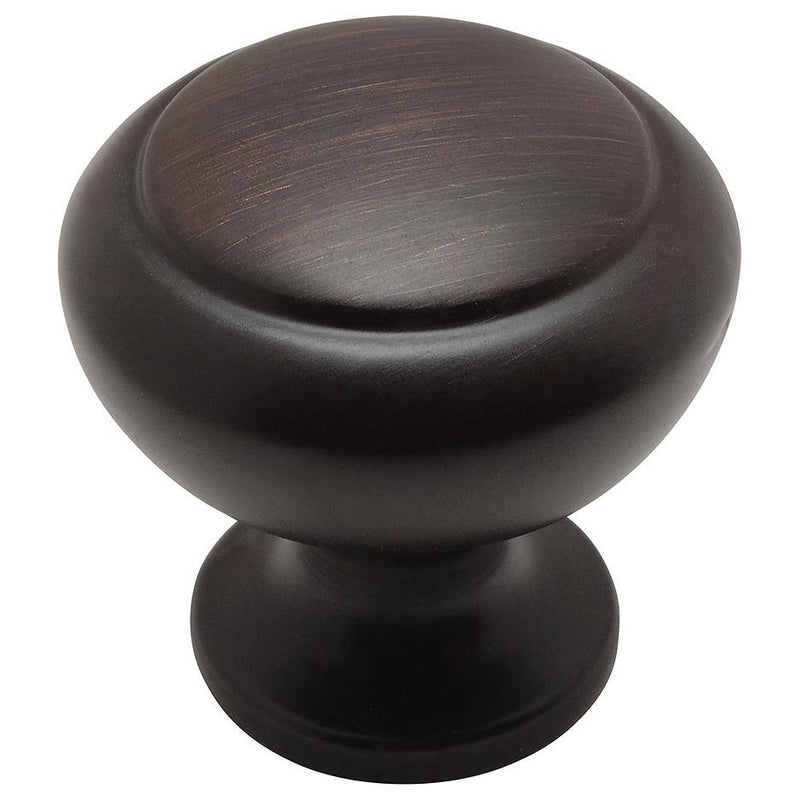 Raised centre design drawer knob in oil rubbed bronze finish and one and a quarter inch diameter