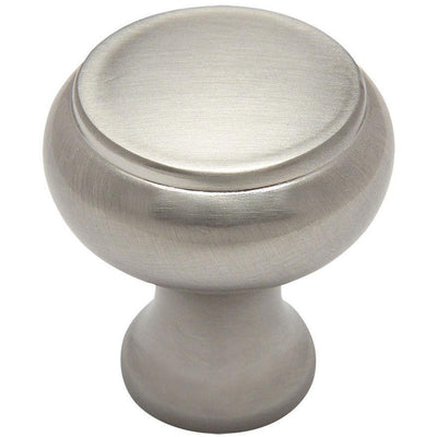 Satin nickel round cabinet drawer knob with raised centre design and one and one eighth inch diameter