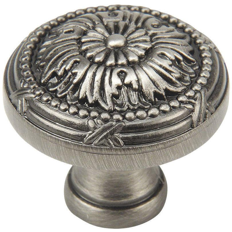 Antique silver drawer knob with decorative classic engraving on all over the top and one and a quarter inch diameter
