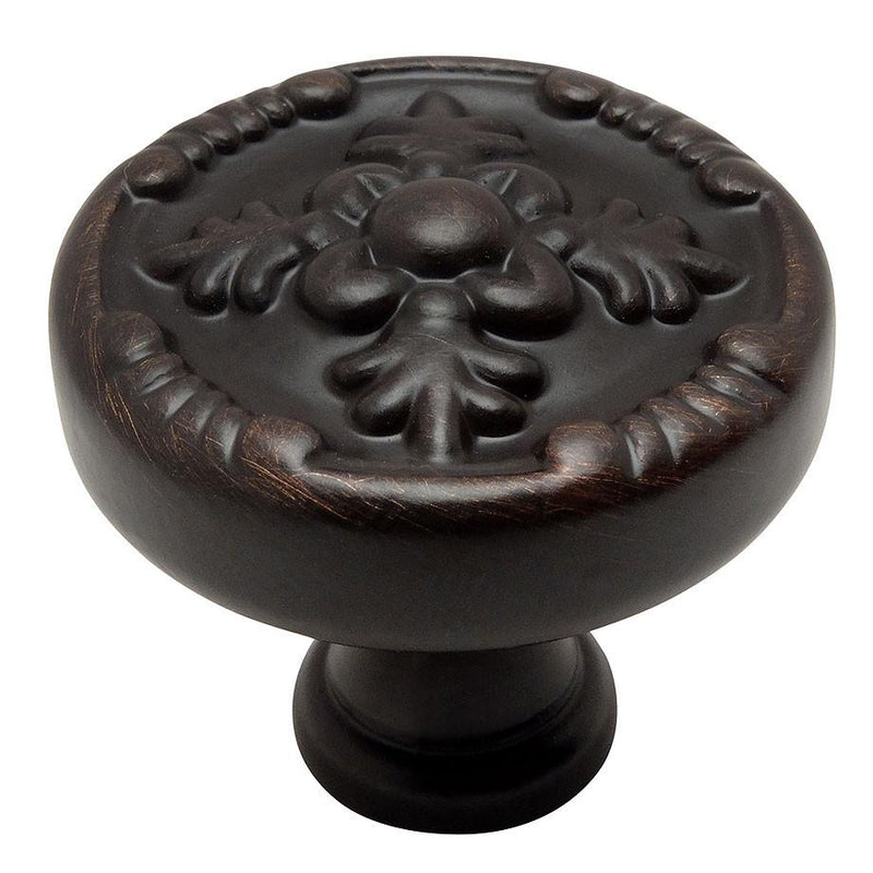 Oil rubbed bronze drawer knob with tree shaped engraving on the face