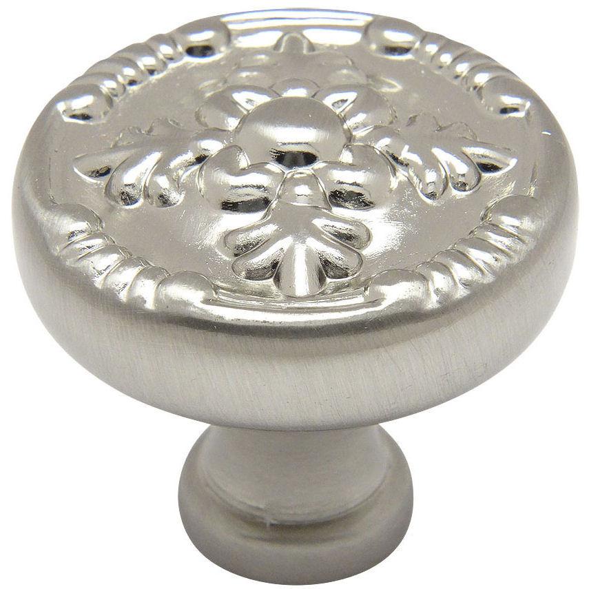 Satin nickel cabinet drawer knob with tree shaped carving on the face