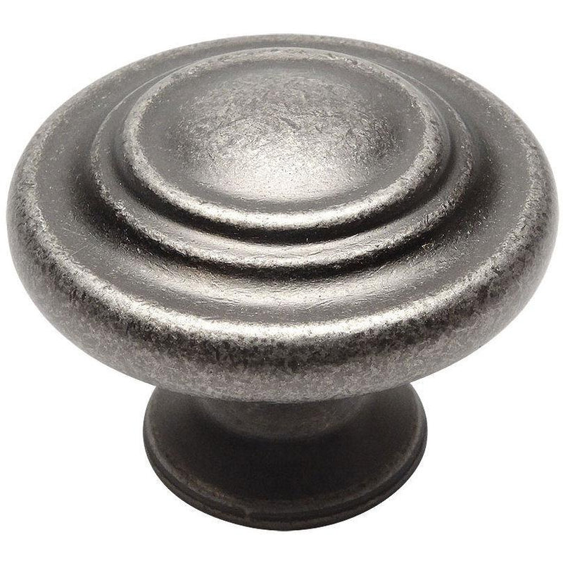 Cabinet knob in weathered nickel finish with two raised rings on the face and one and a quarter inch diameter