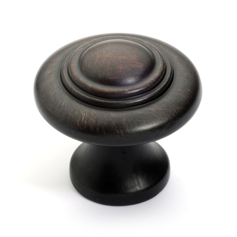 Concentric oil rubbed bronze cabinet knob with slightly raised head at the center and rings accent