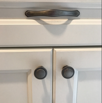 Cosmas 5982WN Weathered Nickel Cabinet Knobs on white cabinets