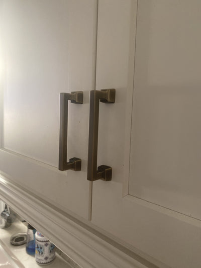 Modern brushed brass cabinet pulls by Cosmas 1481-96BAB.