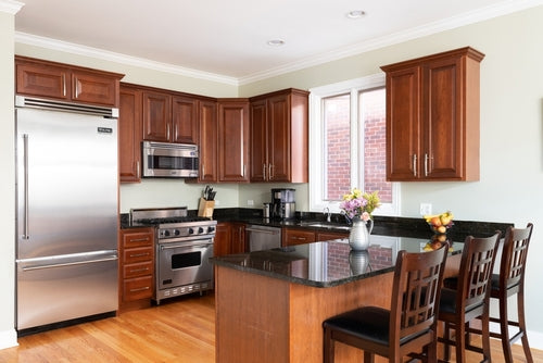 Modern Arch Pulls on Wood kitchen cabinets