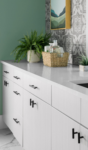 Cosmas 305-2.5FB Flat Black Euro Style Bar Pull. Black pulls on white bathroom vanity