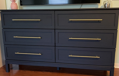 Cosmas 305-320BB Brushed Brass Euro Style Bar Pull on dresser 