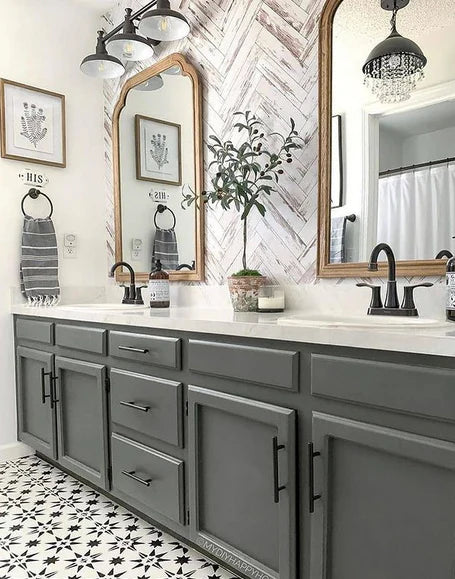 Cosmas 305-4FB Flat Black Euro Style Bar Pull on gray cabinet in bathroom and grey/black floors