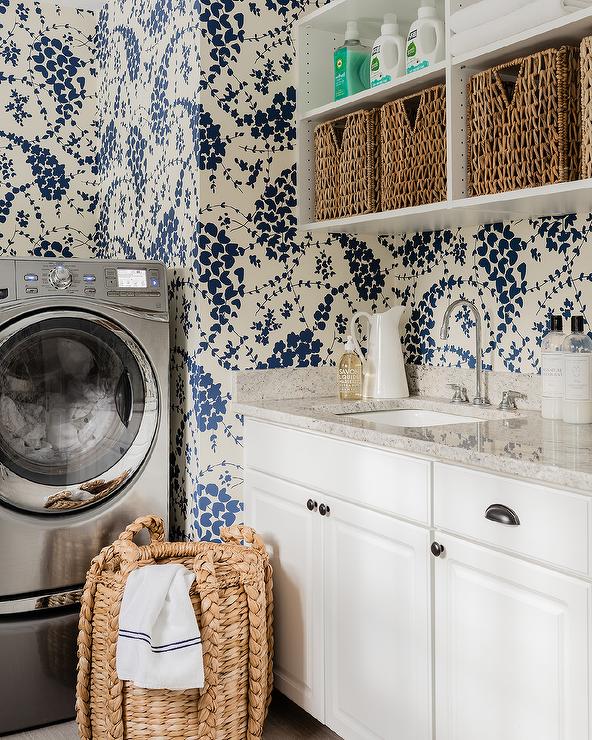 Laundry room with white cabients and a silver cup pull. The cup pull is Cosmas 4310AS Antique Silver Cabinet Cup Pull