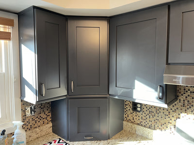 Slate gray shaker cabinets with the weathered nicke Cosmas 4392-128WN 5&quot; cabinet pulls