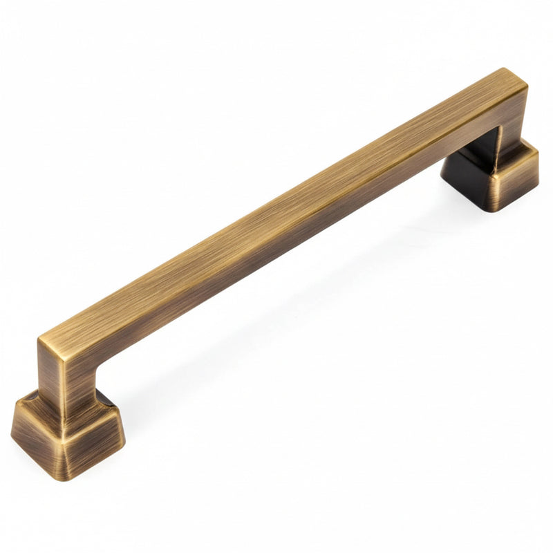 Six and five sixteenths inch hole spacing rigid style cabinet pull in brushed antique brass finish