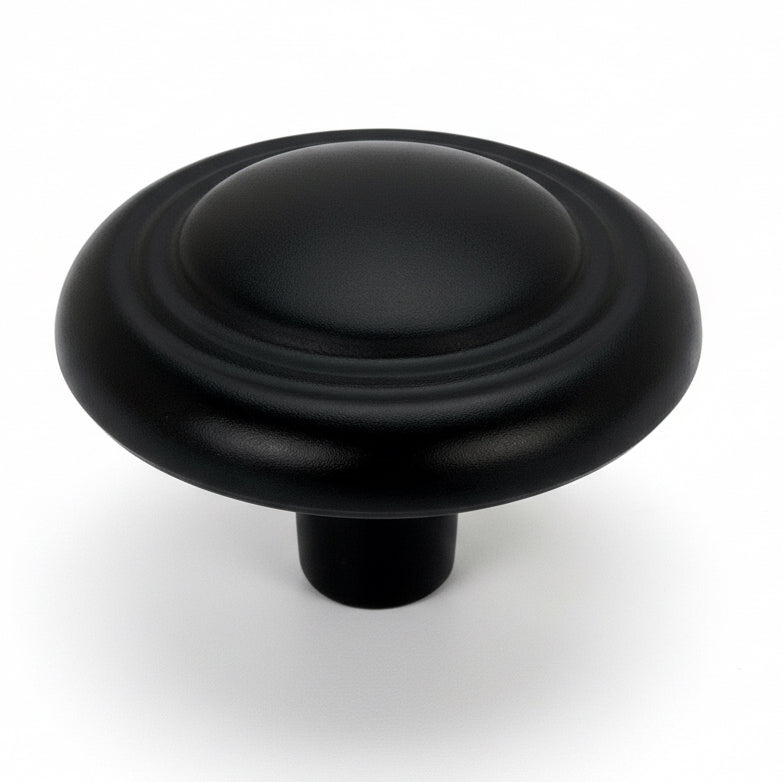 Round drawer knob in flat black finish with double ring and a slightly raised centre