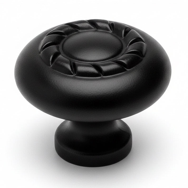 Round flat black cabinet knob with rope design on top and one and three eighteenths inch diameter