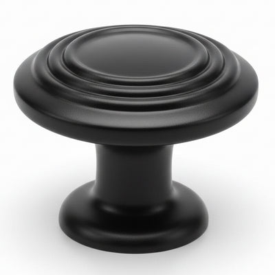 Drawer knob in flat black finish with three raised rings on the face