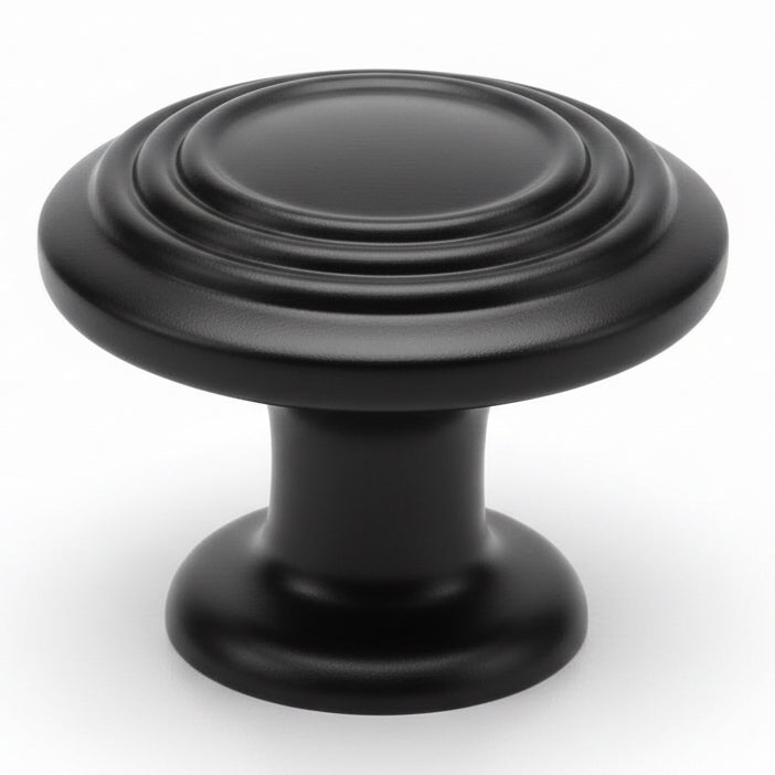 Drawer knob in flat black finish with three raised rings on the face