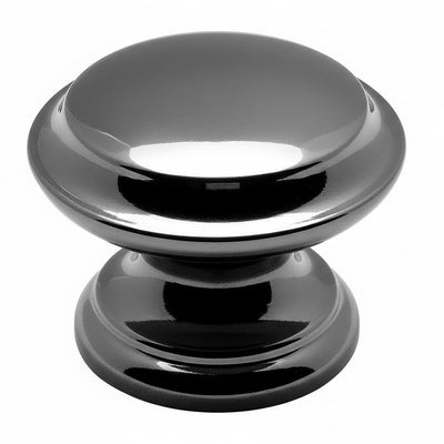 Subtle raised centre drawer knob in black nickel finish with one and three eighths inch diameter