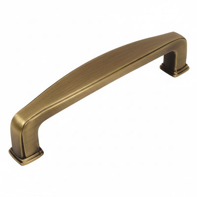 Cabinet handle in brushed antique brass finish with a wide shape in the middle