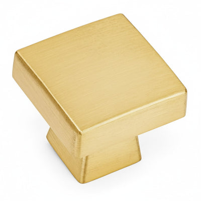 Square cabinet drawer knob in brushed brass finish with one and an eighth inch length