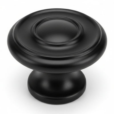 Round diameter knob in flat black finish with two raised rings and one and three sixteenths inch diameter