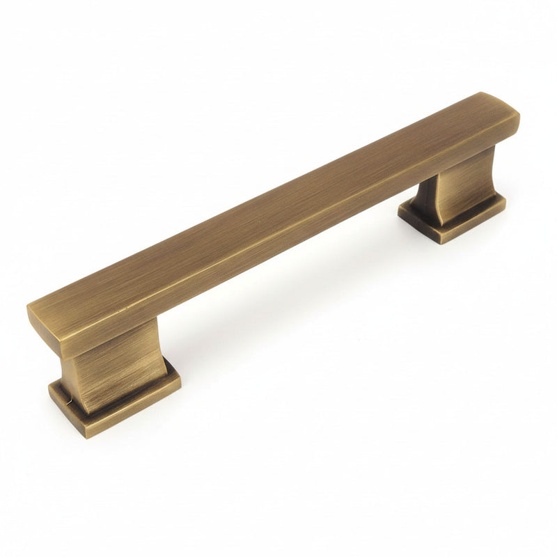 Sturdy cabinet pull in brushed antique brass finish with square edge design and three and a half inch hole spacing