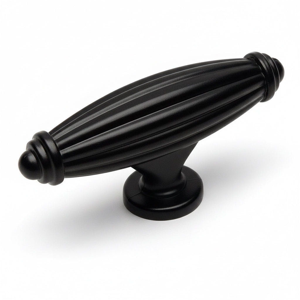 Drawer knob in flat black finish with pointy ends and two and five eighths inch length