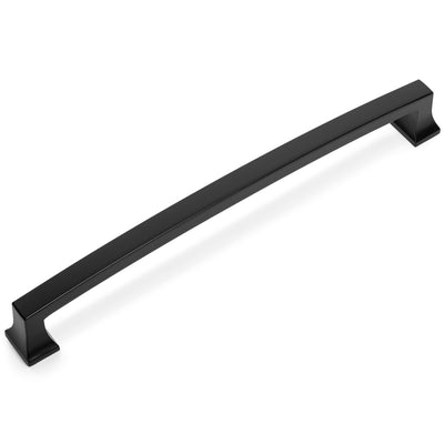 A flat black cabinet pull by Cosmas with an arched shape, designed for mounting on a cabinet door.