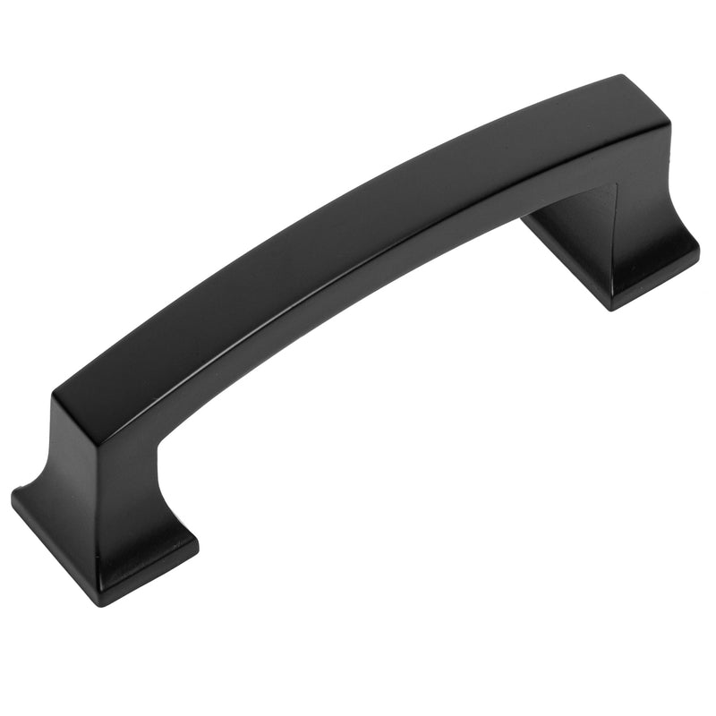 A flat black cabinet pull with a sleek, curved design.