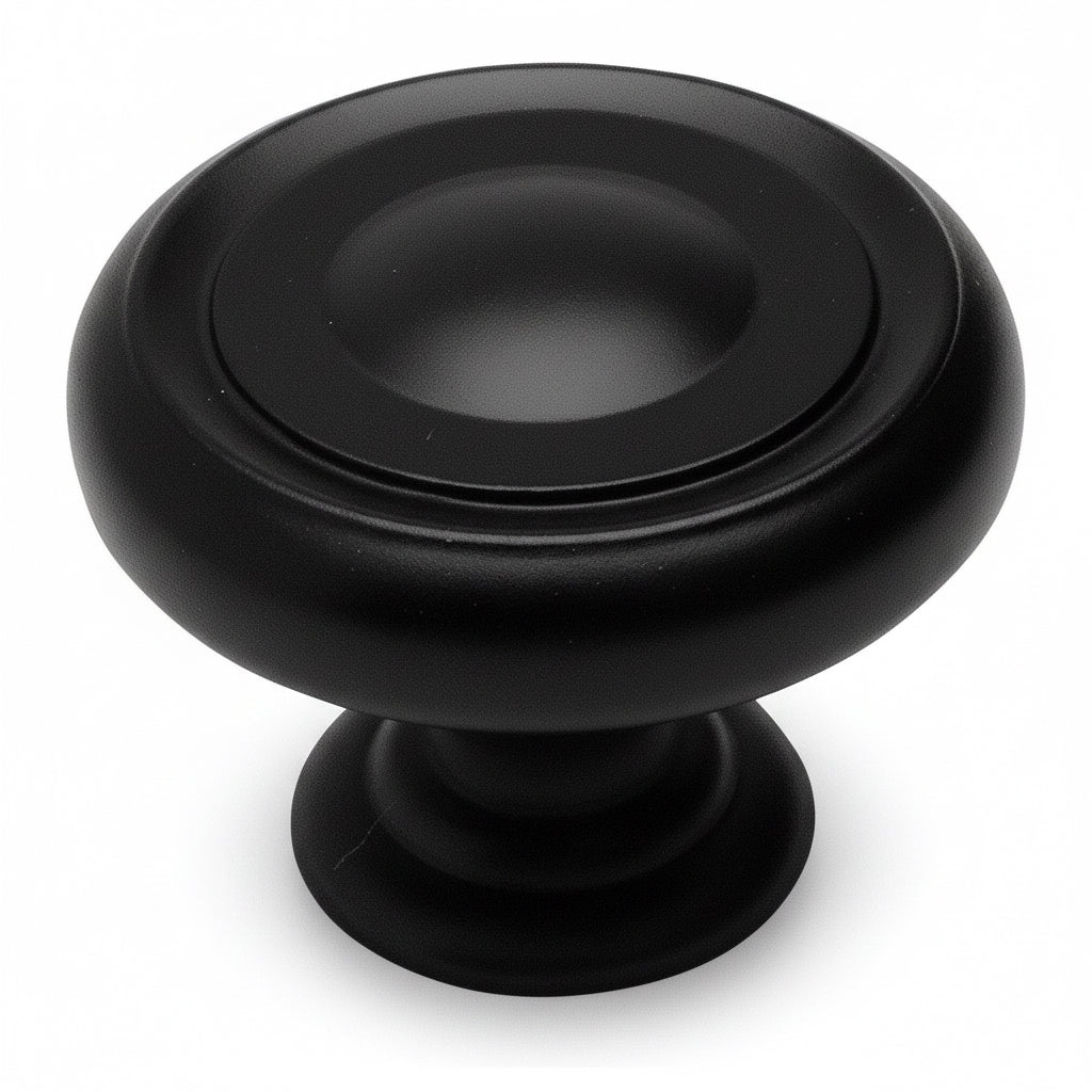 Drawer knob in flat black finish with slightly concave surface