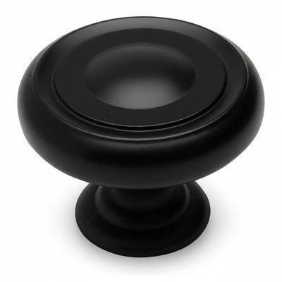 Drawer knob in flat black finish with slightly concave surface