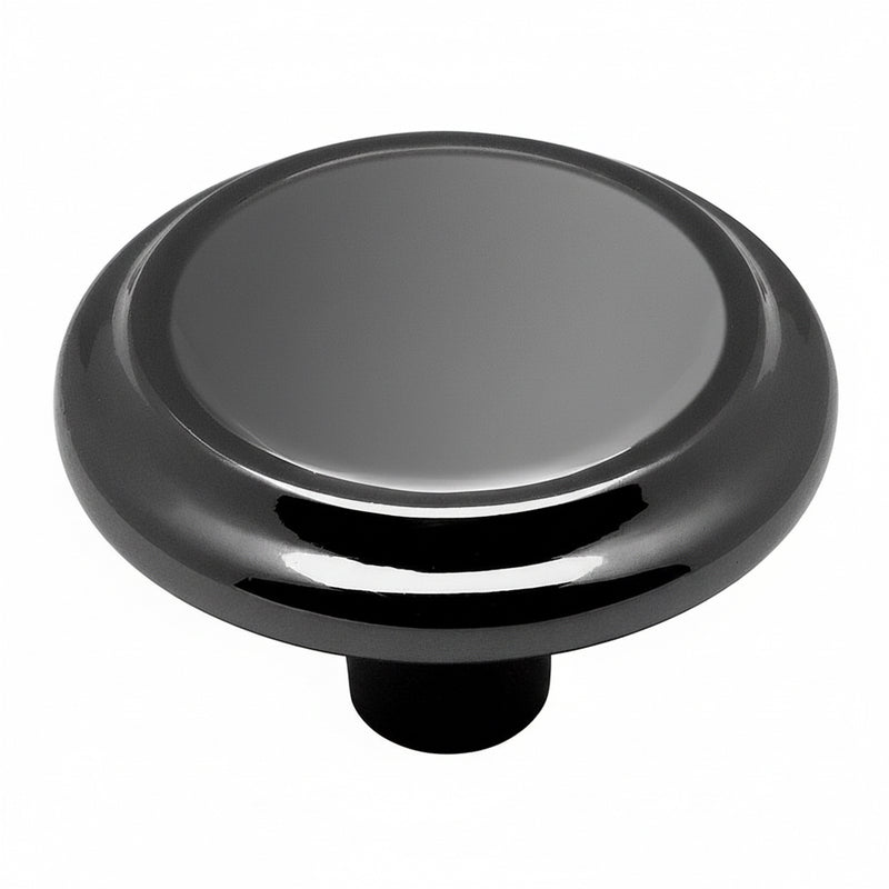 Drawer knob in black nickel finish with raised centre and one and a quarter inch diameter
