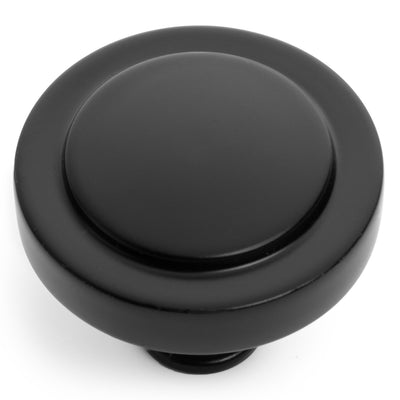 A flat black cabinet knob by Cosmas.