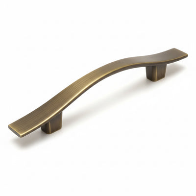 Brushed antique brass drawer pull with wavy design