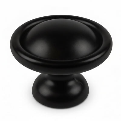 Round cabinet knob in flat black finish with thicker subtle edges