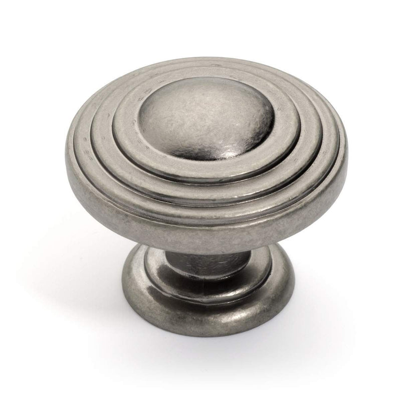 Raised center cabinet knob in antique nickel finish with stacking rings style