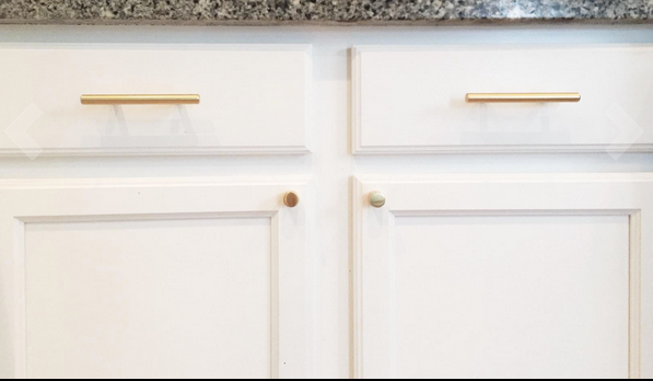 Cosmas 305-030BB Brushed Brass Euro Style Bar Pull on kitchen cabinet