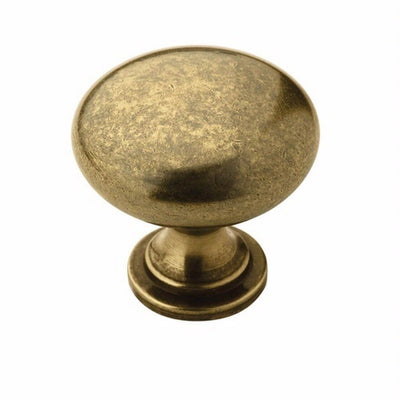Round burnished brass cabinet knob in simple design