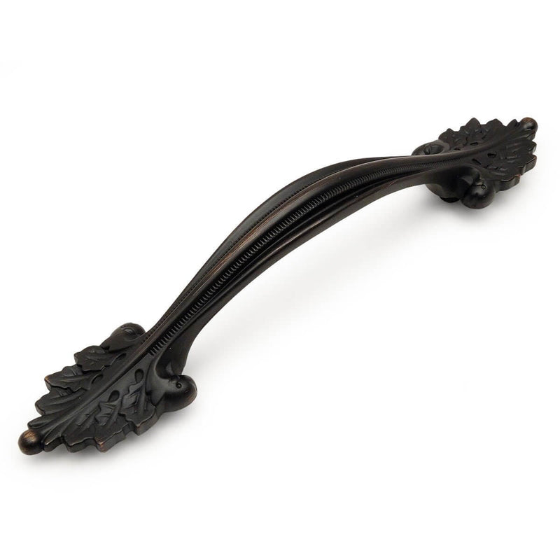 Leaf shaped cabinet pull in oil rubbed bronze finish with three and three quarters hole spacing