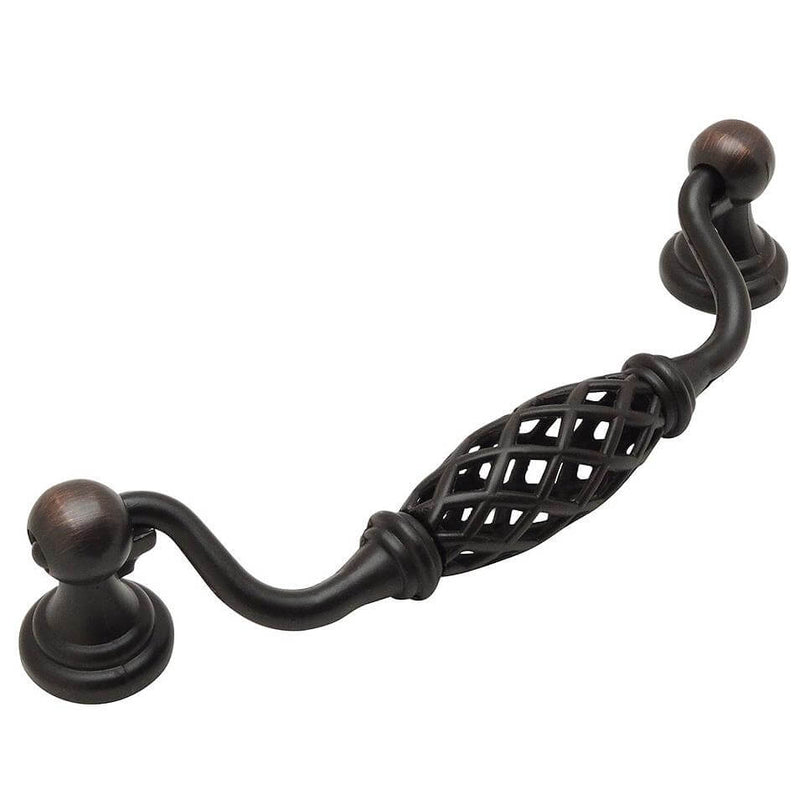 Antique birdcage cabinet pull in oil rubbed bronze with five inch hole spacing