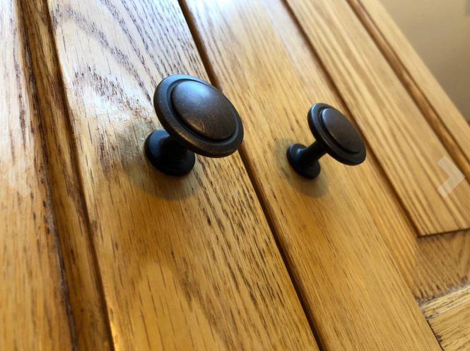 Cosmas 5560 Round Cabinet knob on wood kitchen cabinets